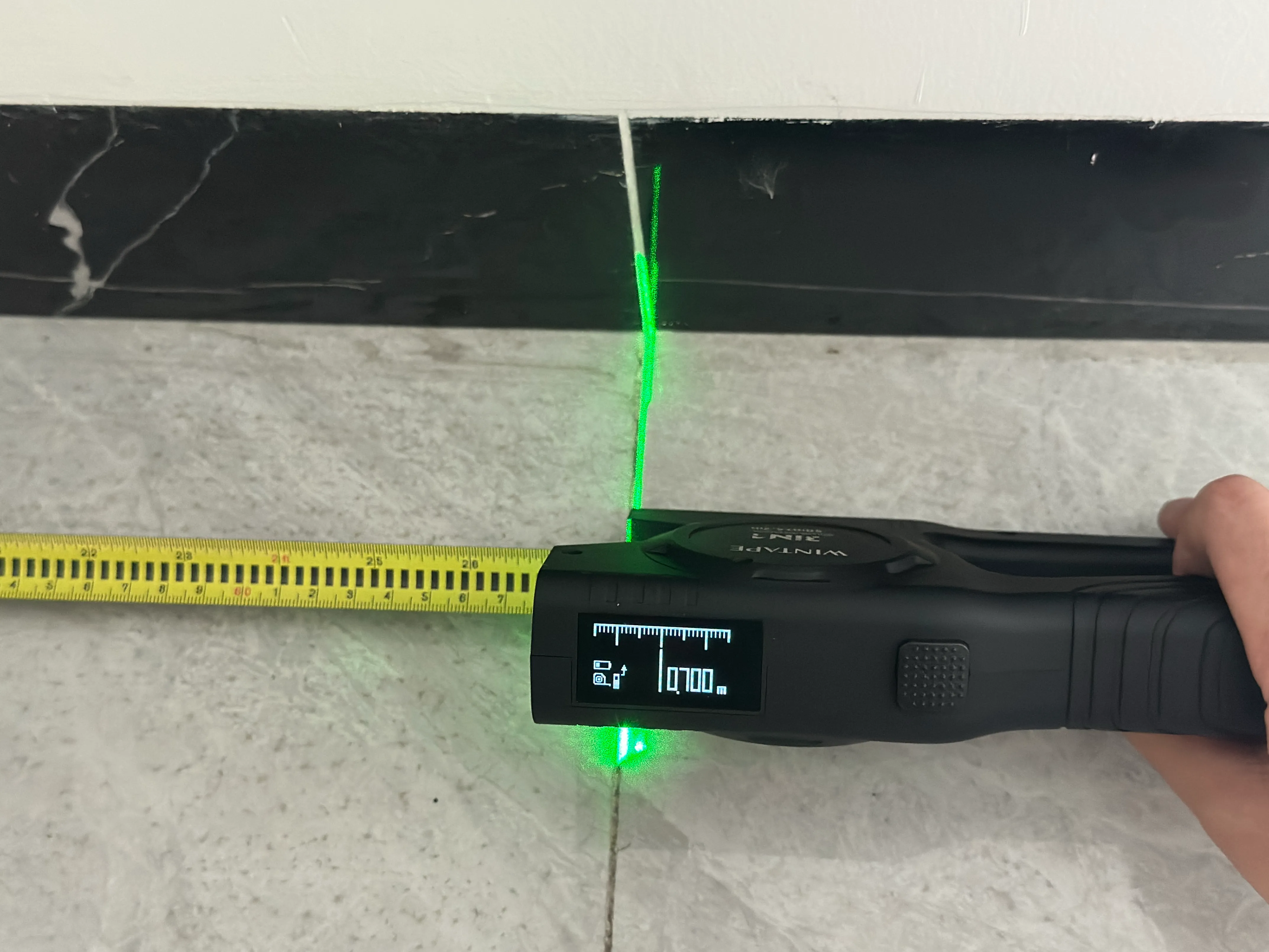digital tape measure with laser.webp 